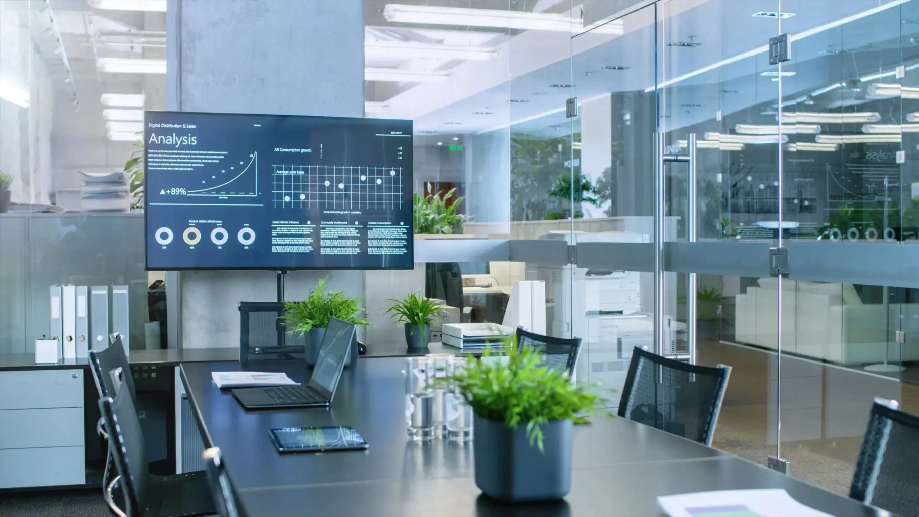 A modern smart office conference room with connected displays, cameras, microphones, speakers, lighting, scheduling, and room controls.