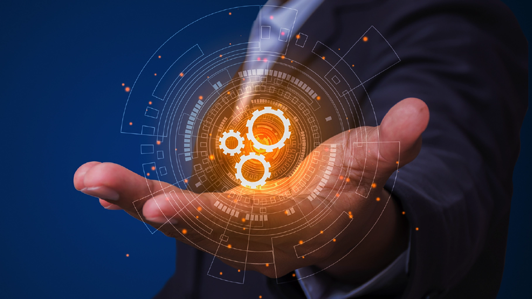 A modern office team using automation dashboards, connected devices, and workflow systems.